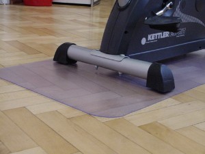 Picture of Floor Protect   10, Unterlagen f. Fitnessgeräte, klarsichtig, Maße: ca 2000 x 700 x 2 mm (LxBxH)